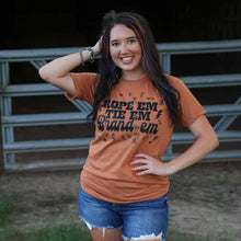 Load image into Gallery viewer, FestiviTees Women - Apparel - Shirts - T-Shirts Rope &#39;Em Tie &#39;Em Brand &#39;Em Soft Graphic Tee